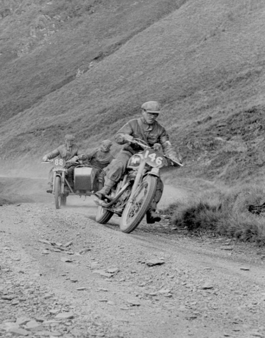 Photo - #146 Ted Usher (Matchless) climbs Bwlch y Groes followed by #88 A J Humphries (Norton sc) ISDT 1949 (Courtesy Deryck Wylde collection)