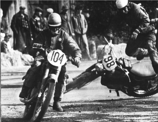 Photo - An other view of #98 F Schneider of West Germany parting with his 175 Hercules in the speed test with #104 HJ Wendelgelst a dutch rider takes a sharp evasive action in the final days speed test ISDT 1961