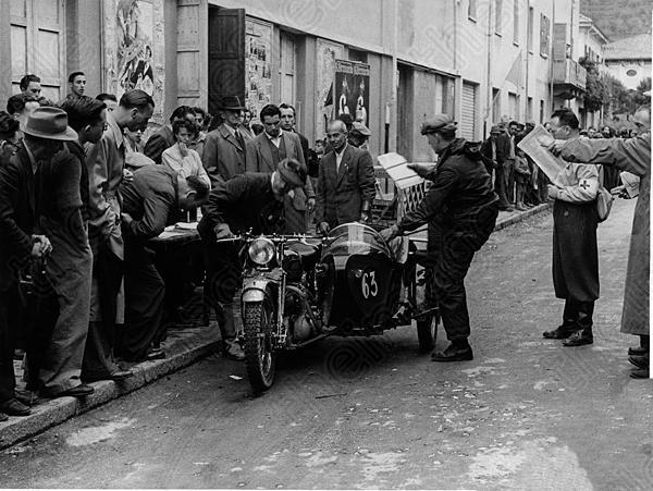 Harold Taylor and John Broadhead with their Vincent:Watsonian outfit JYT 159 at the start of the 148 ISDT in San Remo, Italy.