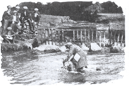 Image of W T Tiffin (Velocette) as his bike sinks out of site in the Asby splash ISDT 1927