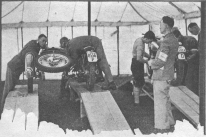 Photo of Czech and German Bikes being presented for weigh in ISDT 1937