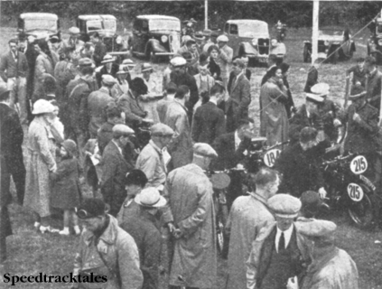Photo - Llandrindod Wells is enjoying a spell of considerable activity on account of the Trial making it's headquarters there. Here is a busy scene during the weighing-in ISDT 1937 (Speedtracktales collection)