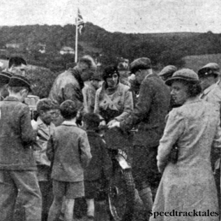 Photo - The famous British woam rider, Miss M Cottle, has, as usual, to face a battery of autograph books. Also, as usual, she is riding a BSA. ISDT 1937 (Speedtracktales collection)
