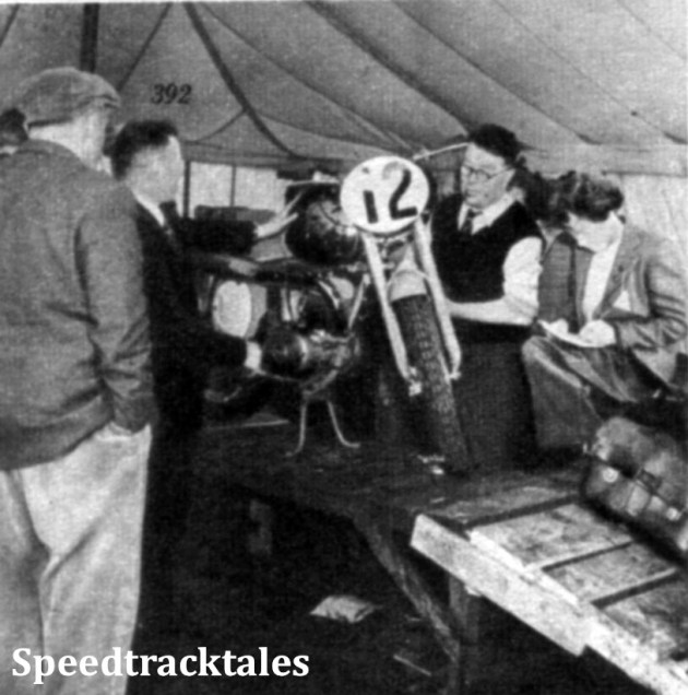 Photo - J. McNulty, in shirtsleeves, scrutineers U. Pohl's German Maico ISDT 1954 (Speedtracktales Collection)