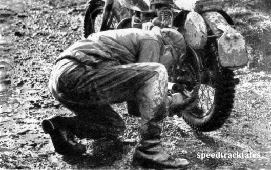 Photo - Slick repair work calls for a cool brain, fast thinking, and nimble fingers ISDT 1950 (Speedtracktales Archive)