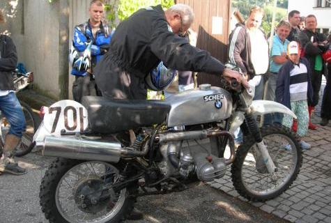 Photo - Sheck starting BMW at an ISDT reunion event at Zschopau in 2011