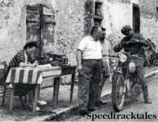 Photo- Stamp control shot of Stocker (499 Royal Enfield) in the 1948 ISDT at San Remo in Italy. On that occaision he was a member of the winning British Silver Vase team