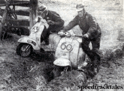 Photo - For them the hardest stint of all - #60 Roy King and #63 Alan Kimber apply the traction which the rear wheels of their Lambrettas can't. ISDT 1960 