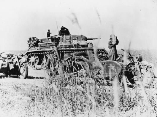 Photo - A Panzerbefehlswagen Ausf H command tank and motorcycles of General Guderian's 2nd Panzer Group, part of Army Group Centre, during Operation Barbarossa, summer 1941. (Image courtesy Imperial War Museum)