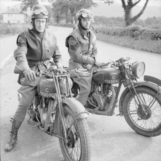 Photo - Sgt J H 'Crasher' White and Sgt Freddie Frith, former racing and trials riders, now motorcycle instructors at an RASC driving and maintenance school at Keswick in the Lake District, October 1942. (Image courtesy Imperial War Museum)