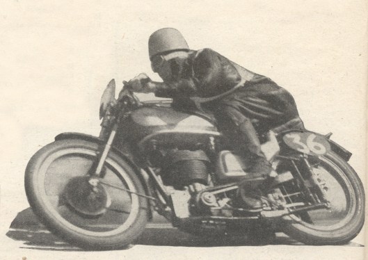 JH ('Crasher') White (Norton) assumes a characteristic crouch as he heels over his Norton in the Grand Prix of Europe , the 350cc class of which he won at 79.78mph (Speedtracktales collection)