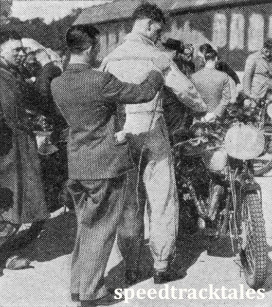image - the Barbour representative measures Allan Jeffries for his "International" suit. These suits are to be worn by all the British Trophy and Vase Team members. (speedtracktales collection)