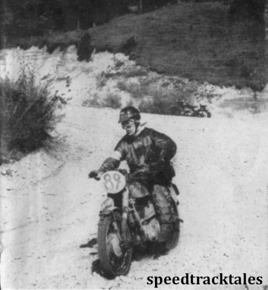 photo - in bright sunshine, Stan Holmes (497cc Ariel) of the British Trophy team hastily slides a loose turn ISDT 1956 (Speedtracktales archive)