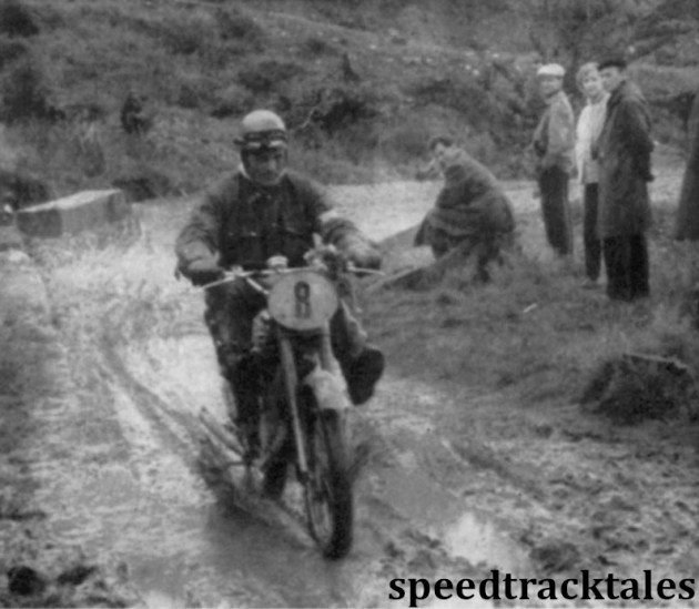photo - member of the Czech Trophy team Alois Roucka (123cc CZ) keeps his boots dry on the muddy track by-passing Misecky ISDT 1957 (Speedtracktales archive)