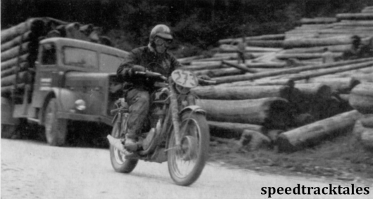 photo - British Trophy teamster, Tim Gibbs (497cc Matchless) hurries past a logging camp ISDT 1960 (Speedtracktales archive)