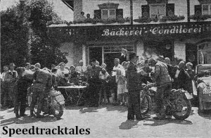 photo - A typical scene at a time check showing the interested crowds which gather to watch the fun. The rider on the right of the picture is Len Heath (Ariel). ISDT 1939 (Speedtracktales Archive)