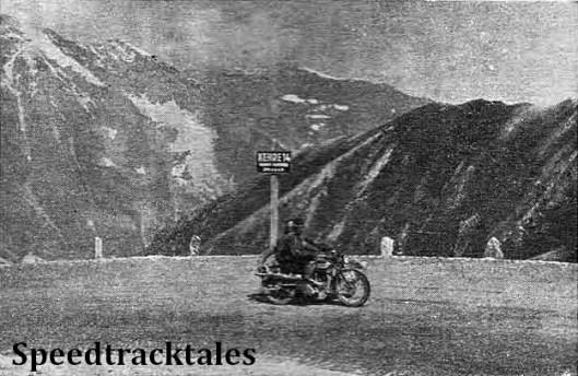 photo - The finest photograph could not do justice to the wonderful scenery through which the route of the trial passed. Here H.J.Flook (596 Norton sc) on the Grossglockner, with a background of snow-capped crags ISDT 1939 (Speedtracktales Collection)