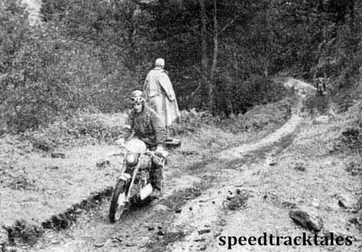 Photo - British Trophy teamster Jack Stocker (692 Royal Enfield) leads a rival down a track in the Mandling District which typifies the terrain in the trial. ISDT 1952 (Speedtracktales Collection)