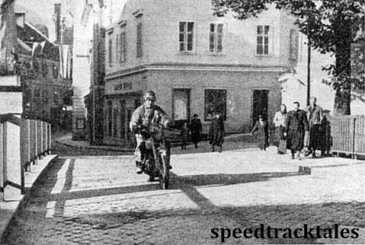 Photo - Sunday morning sunshine in Bad Aussee speeds Jim Alves (649 Triumph) on his way to fight for the Trophy. ISDT 1952 (Speedtracktales Collection)