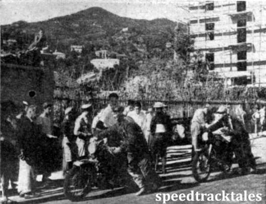 photo - S.F. Board (988 Vincent-HRD) and D.B. Williams (A.J.S), two private British competitors, at the time check in Alassio. As everywhere, British machines were closely inspected by the spectators. ISDT 1948 (Speedtracktales Collection)