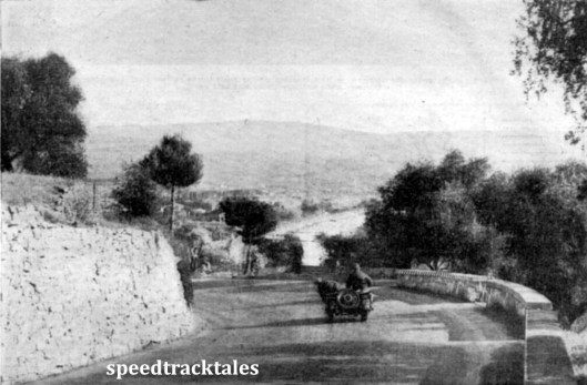 photo - The coast route in the Riviera di Fiori passes through scenes of breathtaking beauty. But H.R. Taylor (998 Vincent-HRD sc) and his passenger have little opportunity to appreciate it. ISDT 1948 (Speedtracktales Collection)