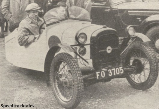 Photo - CB Lloyd and his interesting home-built Heywood 'three-wheeler' [FO 3705] consisting largely of Austin 7. It has twin rear wheels with the driving shaft between them - ISDT 1938 (image courtesy Morton Media)
