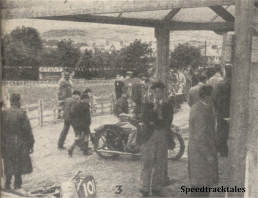Photo - Good cover during the weighing-in. Behind the enclosure is the pleasant Welsh mountain country through which the trial is passing and on the opposite side of the paddock is the starting post - ISDT 1938 (image courtesy Morton Media)