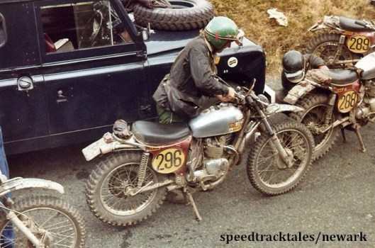 Photo - Gold medal winner #296 Mick Andrews and the bikes of #288 Malcolm Rathmell who fettles on his bike and #289 Arthur Browning  ISDT 1971 (Newark Collection)