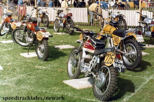 Photo - Park Ferme with the bikes of #225 Dai Jeremiah GB Bultaco [UDW889J] #239 Mick 'Bonky' Bowers GB Ossa #240 F Vergani Italy #253 D Thorpe GB Ossa ISDT 1971 (Newark Collection)