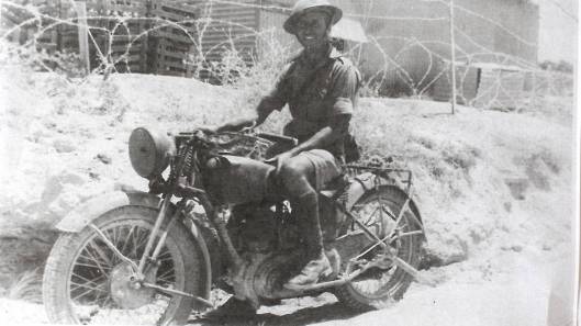 Photo - Dispatch Rider Bob Anson in Syria 1942 on 1939 Norton. (Newcastle Herald)
