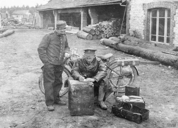 British dispatch rider takes a message in Belgian village-$14113118$605